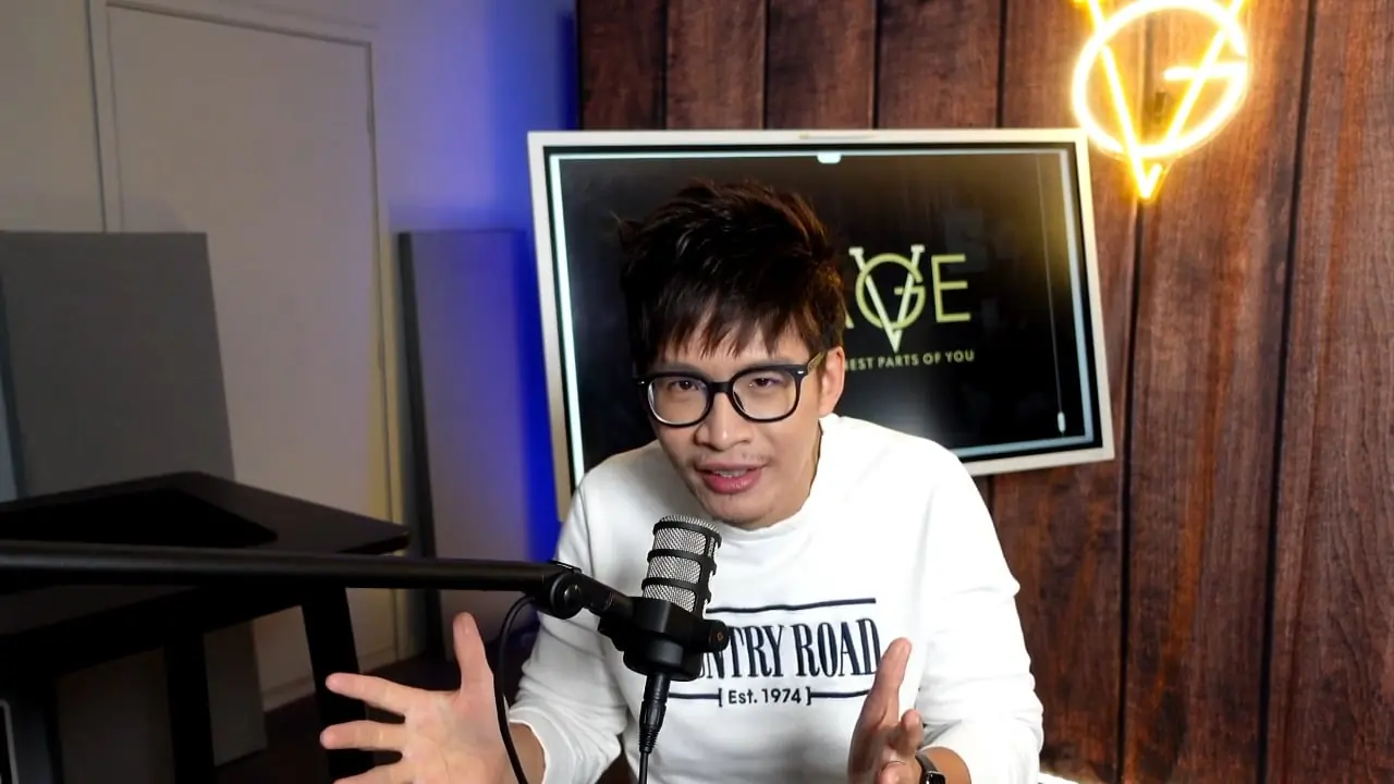 Vinh Giang, keynote speaker and magician, speaking to the camera in his video message about Johnny Wu